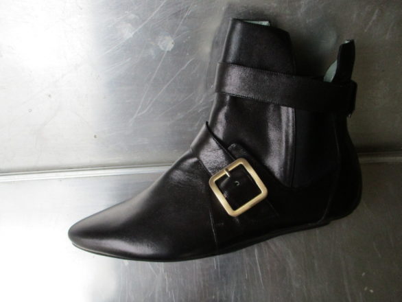 Low black leather ankle boots with buckles and pointed front