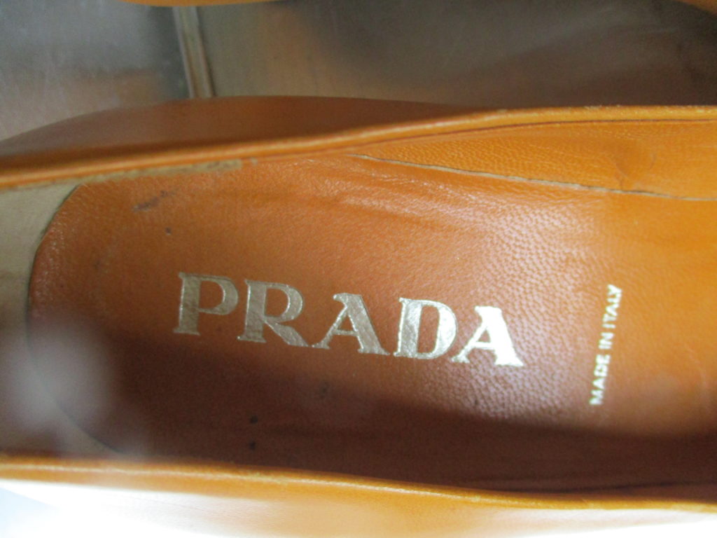 Prada orange leather pumps